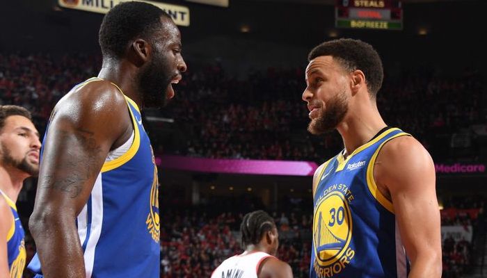 Stephen Curry et Draymond Green réagissent à la défaite des Warriors