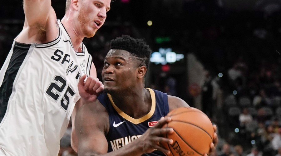 Zion spurs double-double