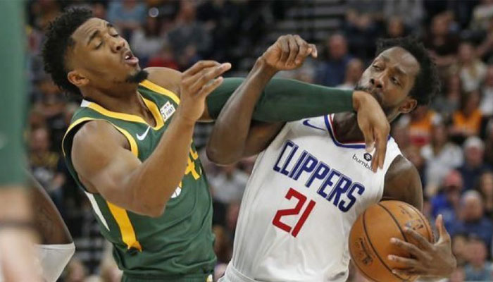 Donovan Mitchell à la lutte avec Patrick Beverley