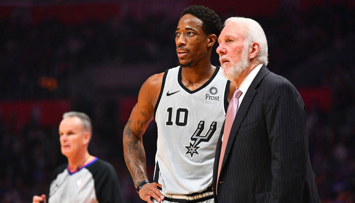 Gregg Popovich et DeMar DeRozan des San Antonio Spurs