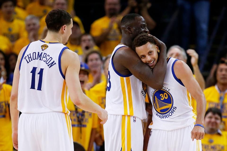 Klay Thompson, Draymond Green et Steph Curry des Warriors