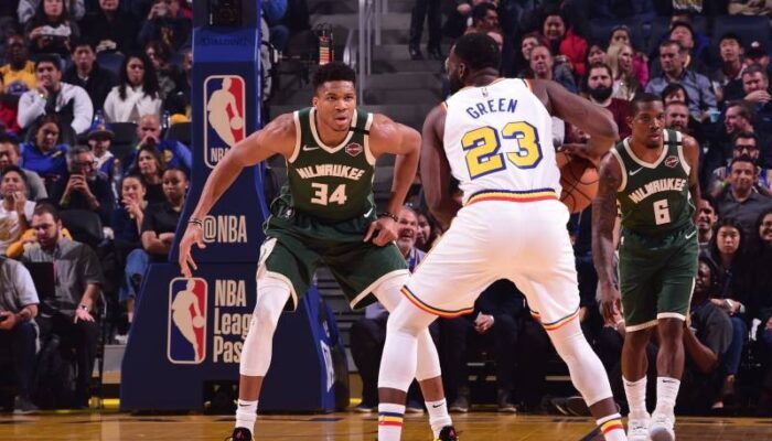 Giannis Antetokounmpo et Draymond Green