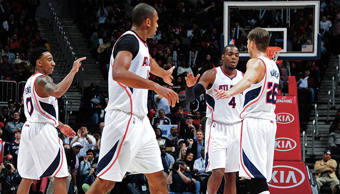 Jeff Teague, Al Horford, Paul Millsap et Kyle Korver sous le maillot des Atlanta Hawks lors de la saison 2014-15