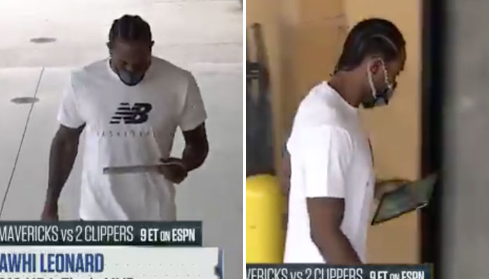 Kawhi Leonard est arrivé en regardant l'écran d'accueil de son téléphone