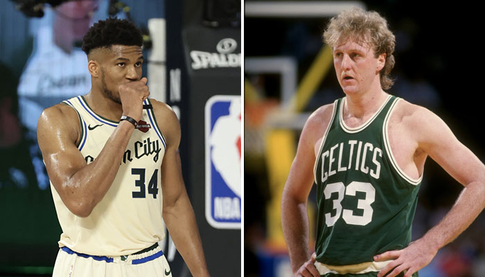 Giannis Antetokounmpo sous les couleurs des Milwaukee Bucks et la légende NBA Larry Bird sous le maillot des Celtics