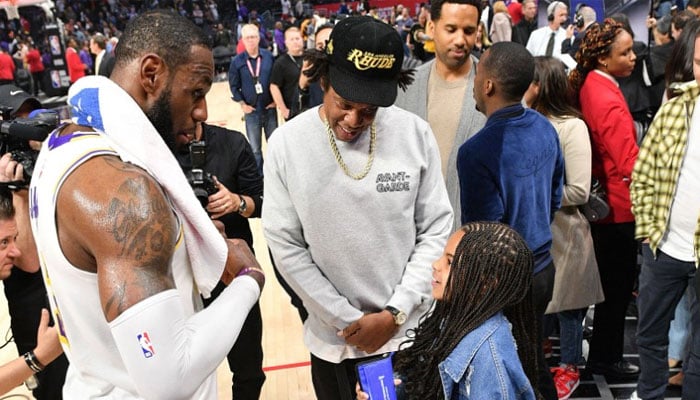 Jay-Z, sa fille Blue Ivy, et LeBron James après un match des Lakers NBA