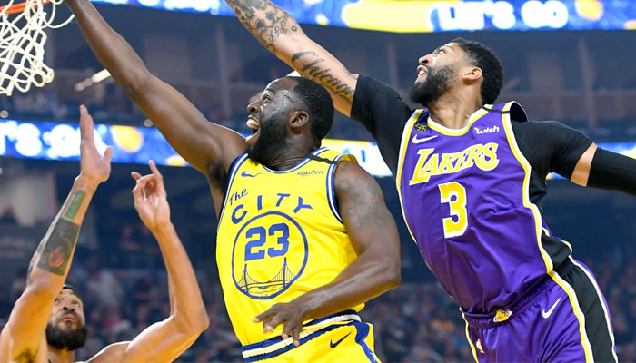 Anthony Davis tente de contrer Draymond Green NBA