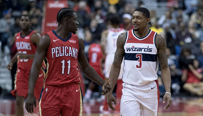 Les stars NBA Jrue Holiday (à gauche), joueur des New Orleans Pelicans, et Bradley Beal (à droite), joueur des Washington Wizards