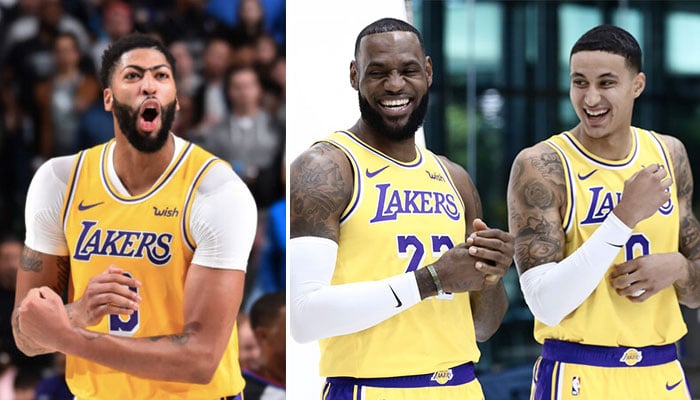 L’intérieur NBA star des Los Angeles Lakers, Anthony Davis (gauche), subit les moqueries de LeBron James devant un Kyle Kuzma hilare