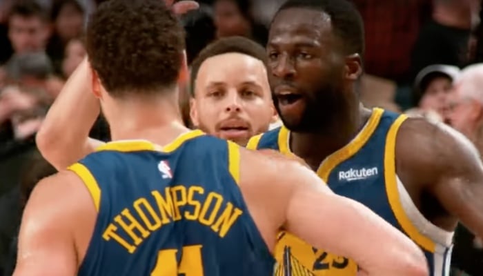 Le trio de stars NBA des Golden State Warriors, Klay Thompson (gauche), Stephen Curry (centre) et Draymond Green (droite)