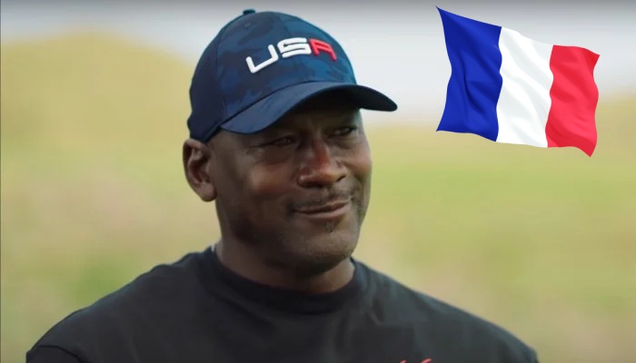 La légende NBA Michael Jordan, accompagné du drapeau de la France