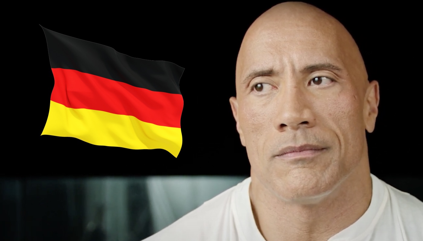 La star du catch et d'Hollywood Dwayne « The Rock » Johnson, ici accompagné du drapeau de l'Allemagne
